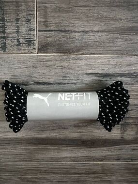 black and white dotted Puma NETFIT shoelaces
